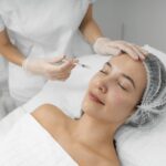 beautician-doing-injection-filler-female-client-salon